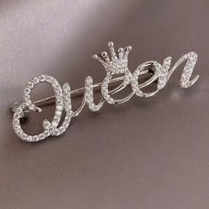 Silver Queen Brooch with Crown Design